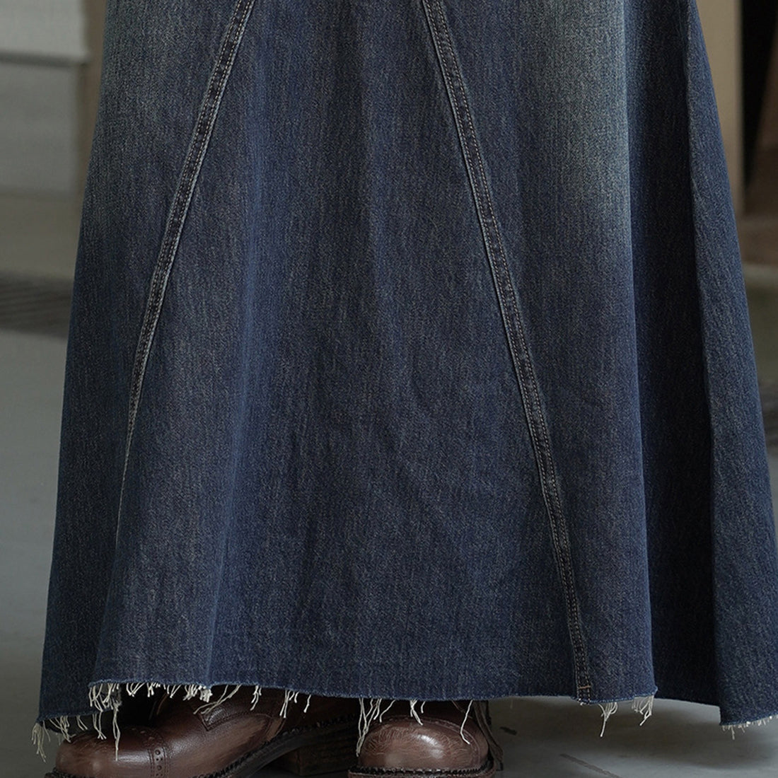 Vintage high waisted slightly fringed denim long skirt