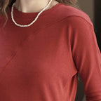 Asymmetric curved strap slim fit top