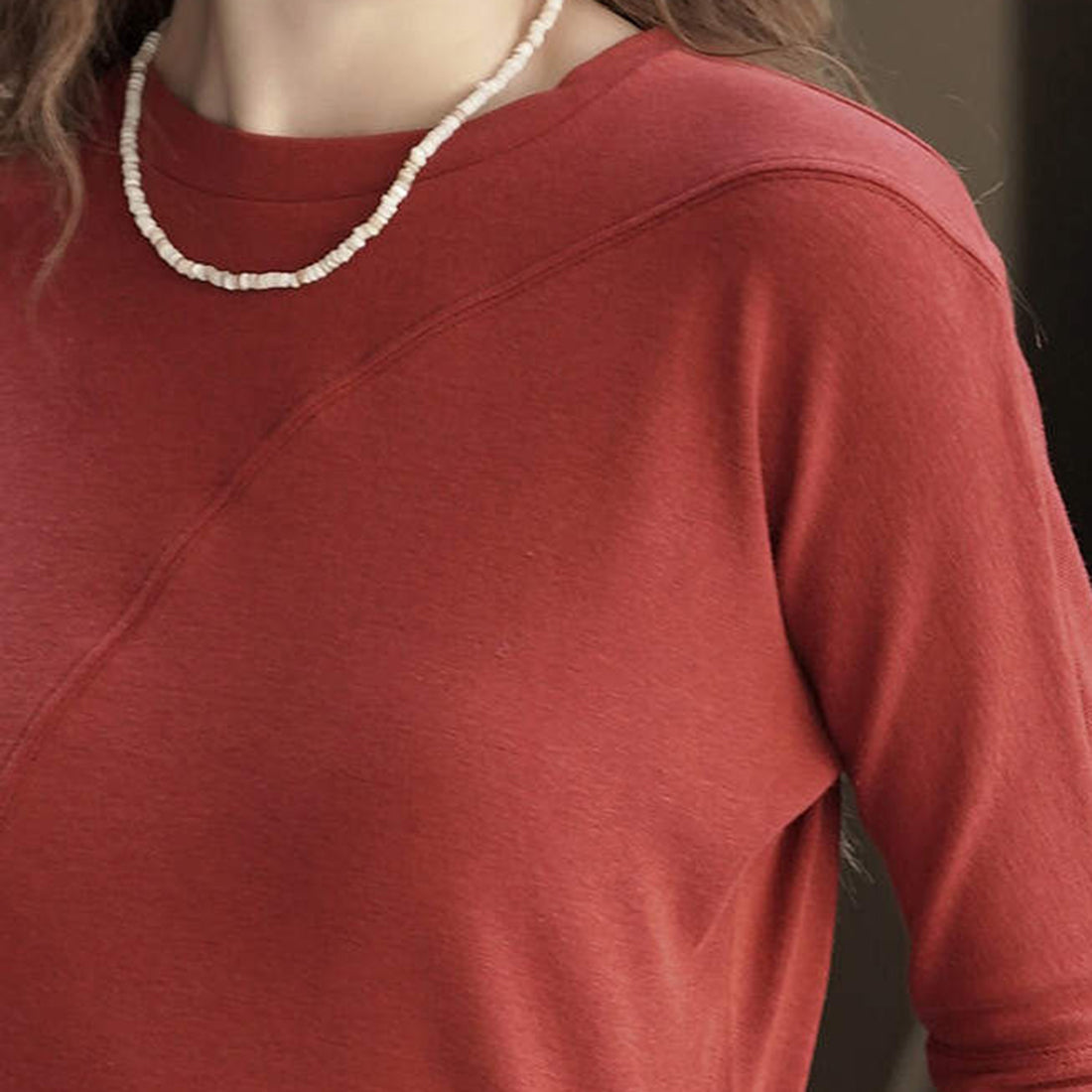 Asymmetric curved strap slim fit top