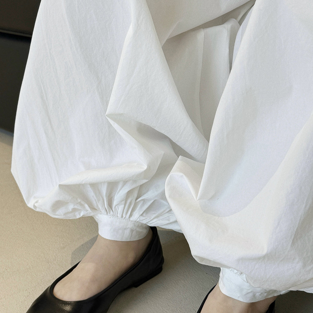 Solid color button tied foot balloon pants