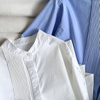 Wrinkled round neck long sleeved shirt