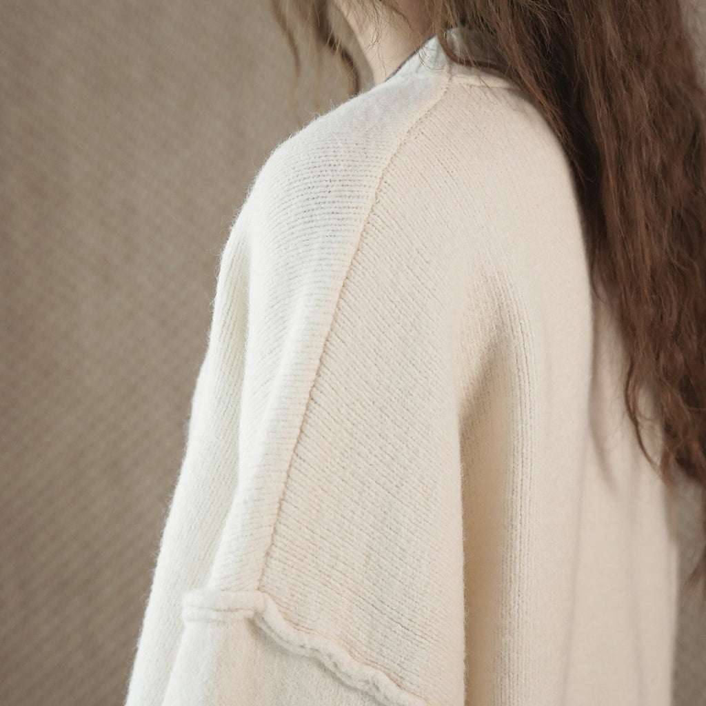Round neck slightly frayed knitted loose sweater