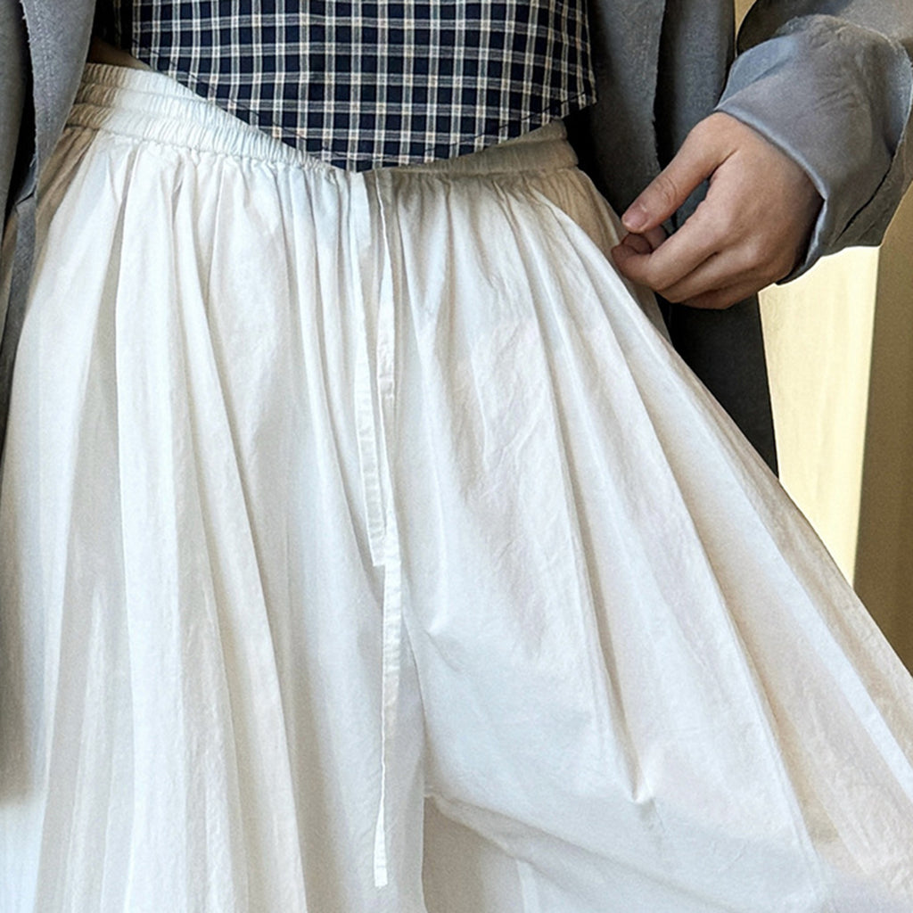 Solid color button tied foot balloon pants