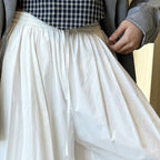 Solid color button tied foot balloon pants