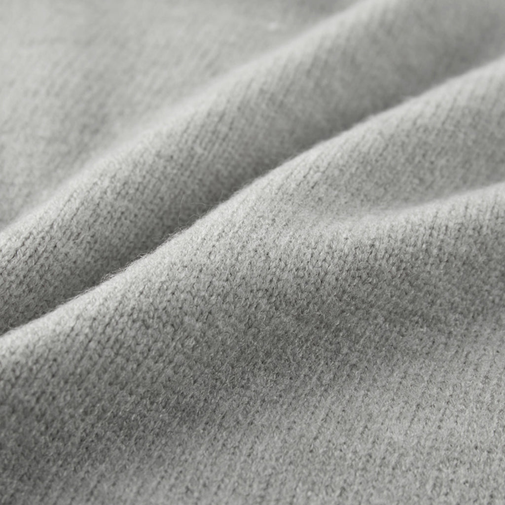 Asymmetric hem solid color round neck knitted vest top