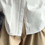 Wrinkled round neck long sleeved shirt