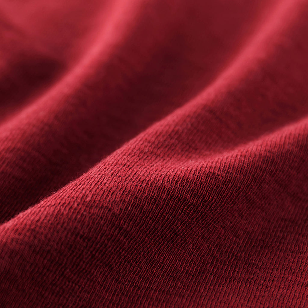 Asymmetric curved strap slim fit top