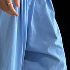 Loose fit high waist draped cuffed pants