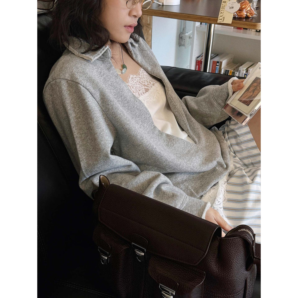 Oversized V-neck pullover sweatshirt with raw edge collar and relaxed fit