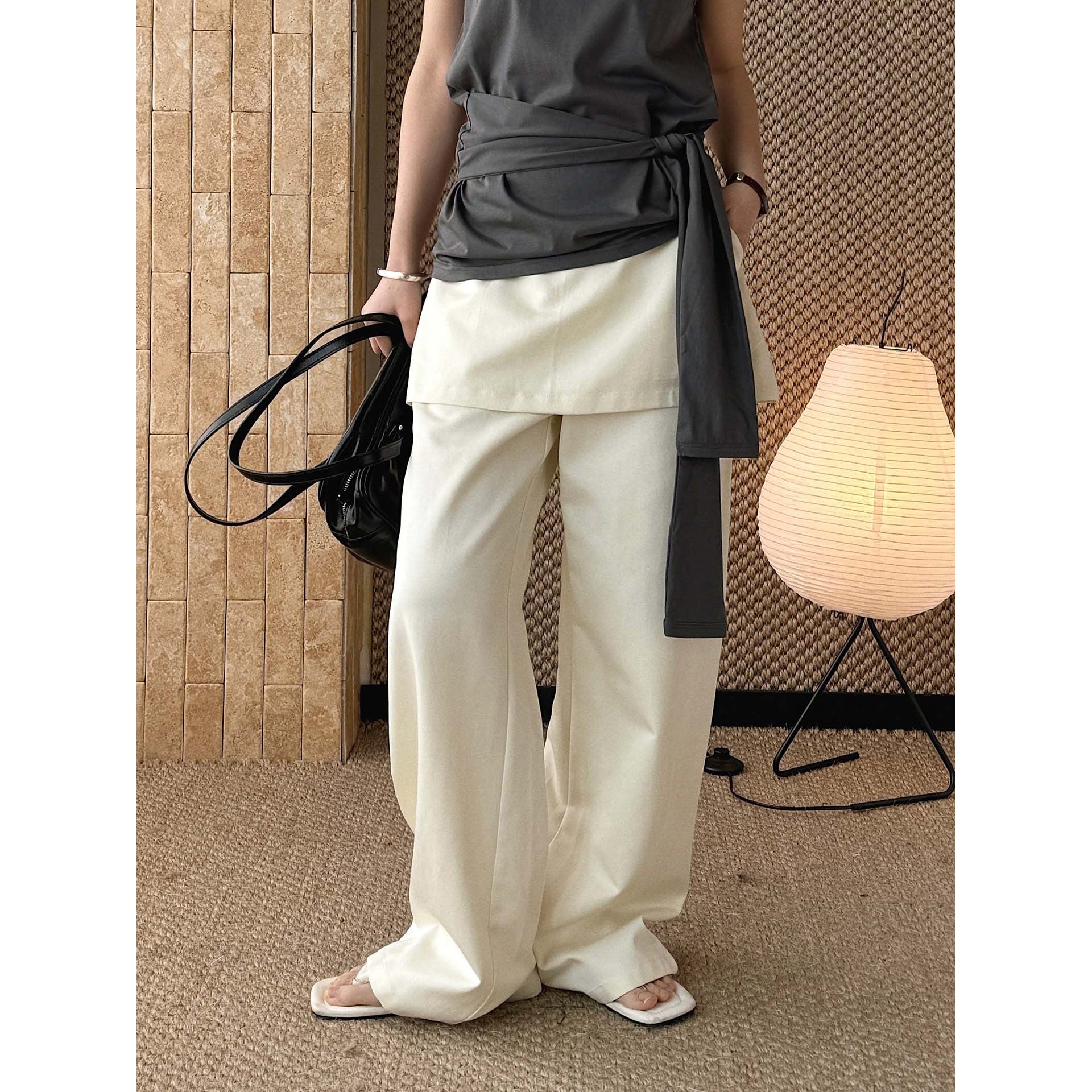 High-waisted Tencel cotton wide-leg pants in relaxed draped silhouette