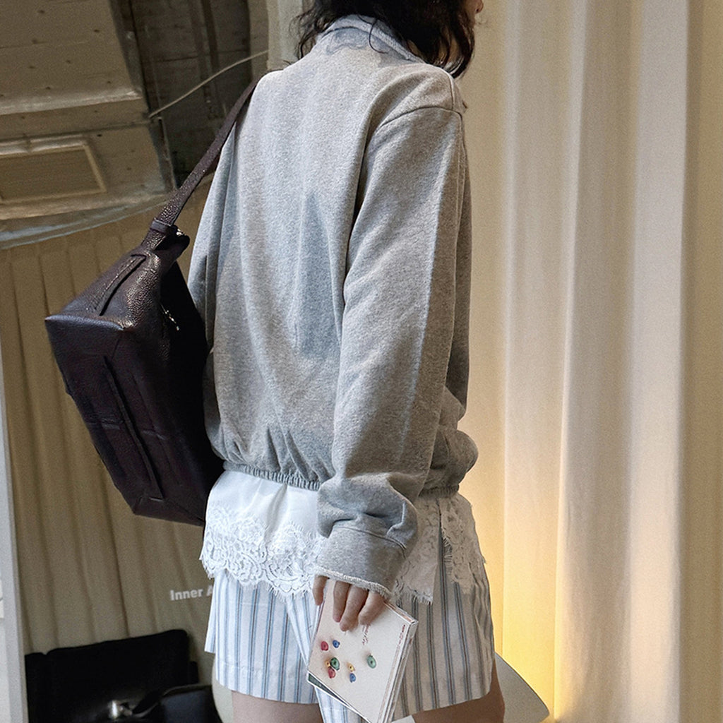 Oversized V-neck pullover sweatshirt with raw edge collar and relaxed fit