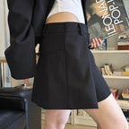 Structured high-waisted mini skirt with inner shorts lining