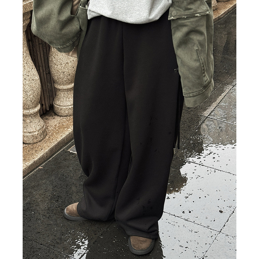 Elastic high waisted side straps and loose wide leg pants