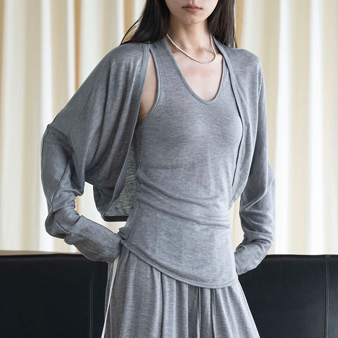 Curved short slim fit cardigan top