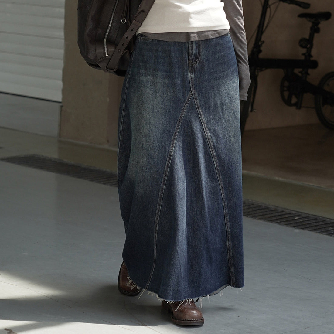Vintage high waisted slightly fringed denim long skirt