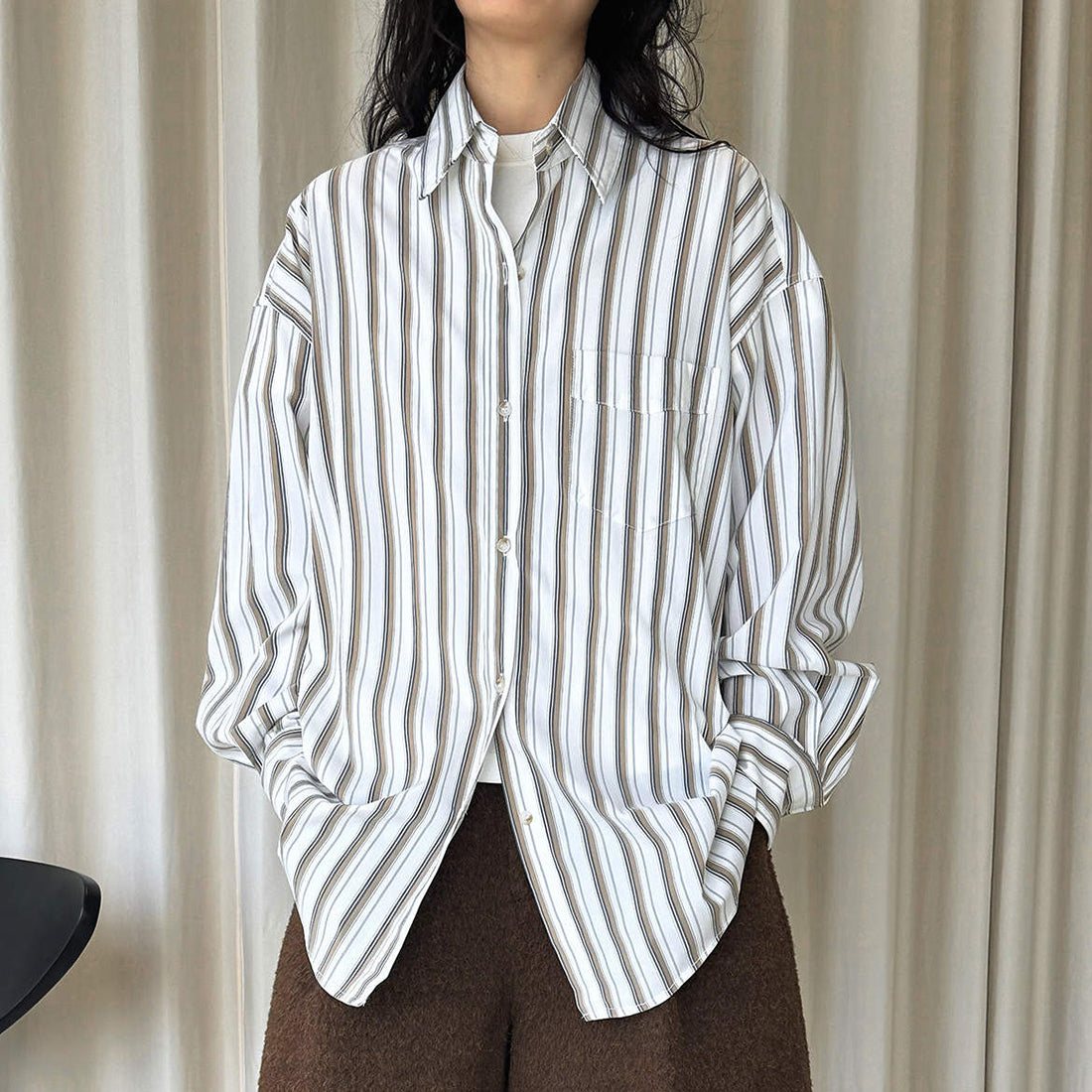 Striped long sleeved loose silhouette slimming shirt top