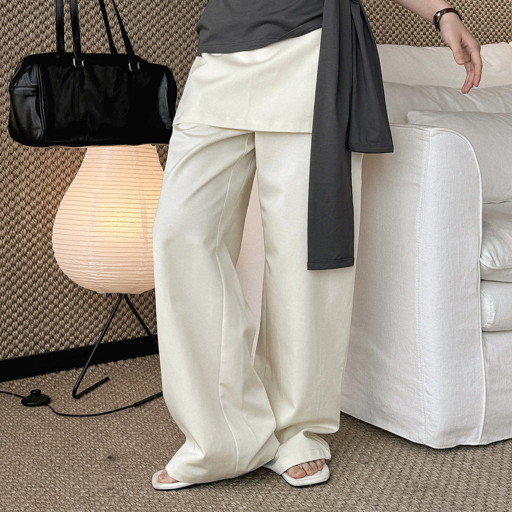 High-waisted Tencel cotton wide-leg pants in relaxed draped silhouette
