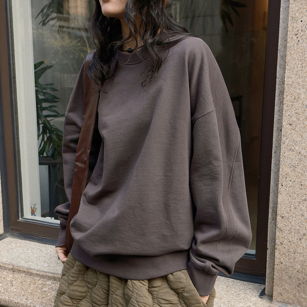 Round neck solid pullover loose long sleeved sweatshirt