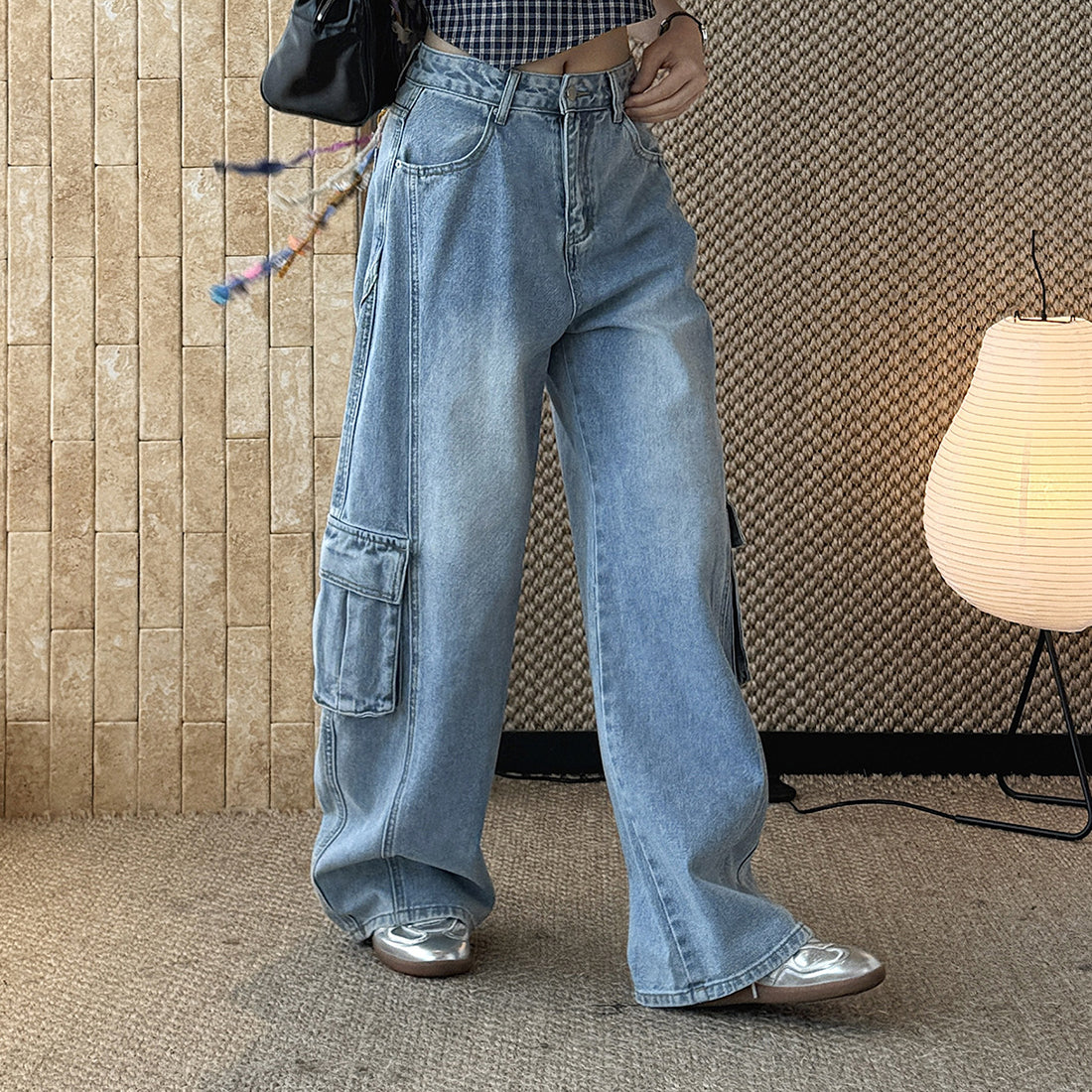 High waist vintage wash cargo wide leg jeans with utility pockets