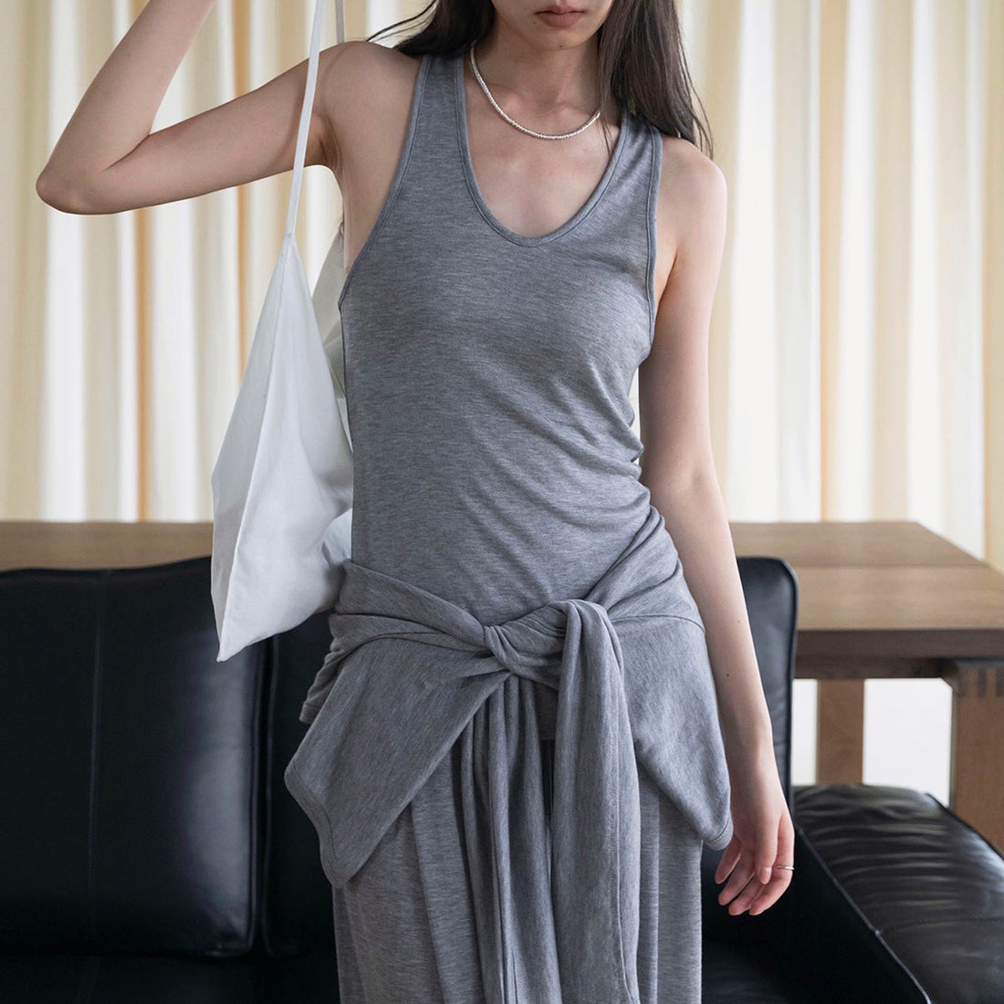U-neck irregular hem sleeveless slim fit vest top
