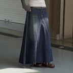 Vintage high waisted slightly fringed denim long skirt