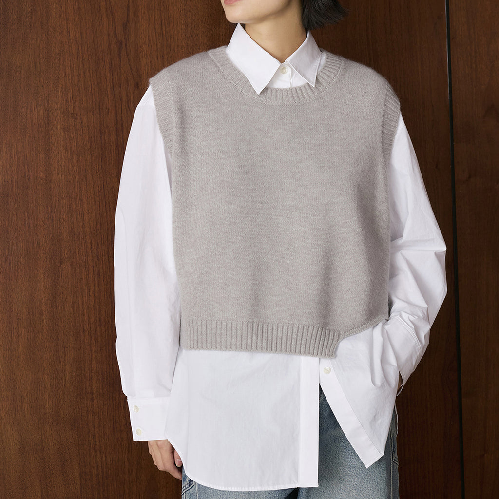 Asymmetric hem solid color round neck knitted vest top