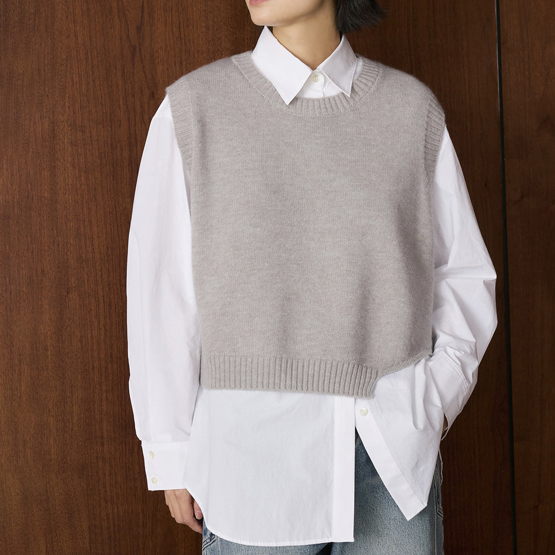 Asymmetric hem solid color round neck knitted vest top