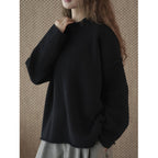 Round neck slightly frayed knitted loose sweater