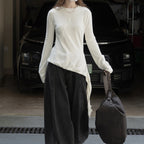 Asymmetric curved strap slim fit top