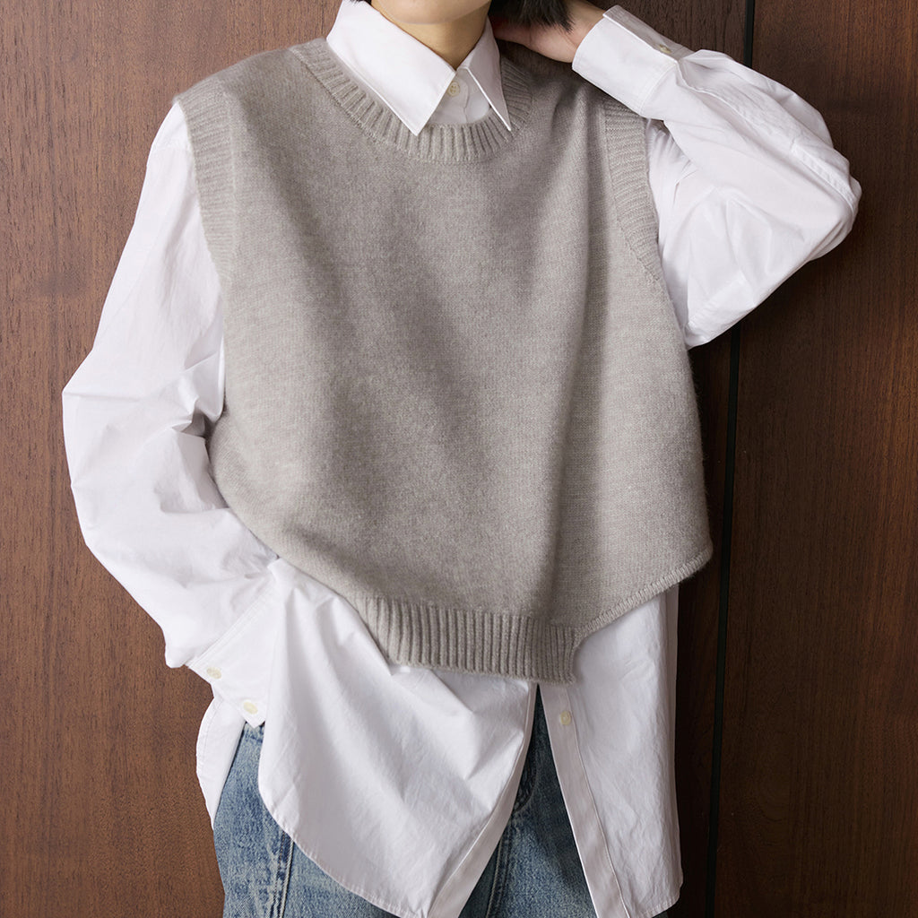 Asymmetric hem solid color round neck knitted vest top