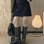 Structured high-waisted mini skirt with inner shorts lining