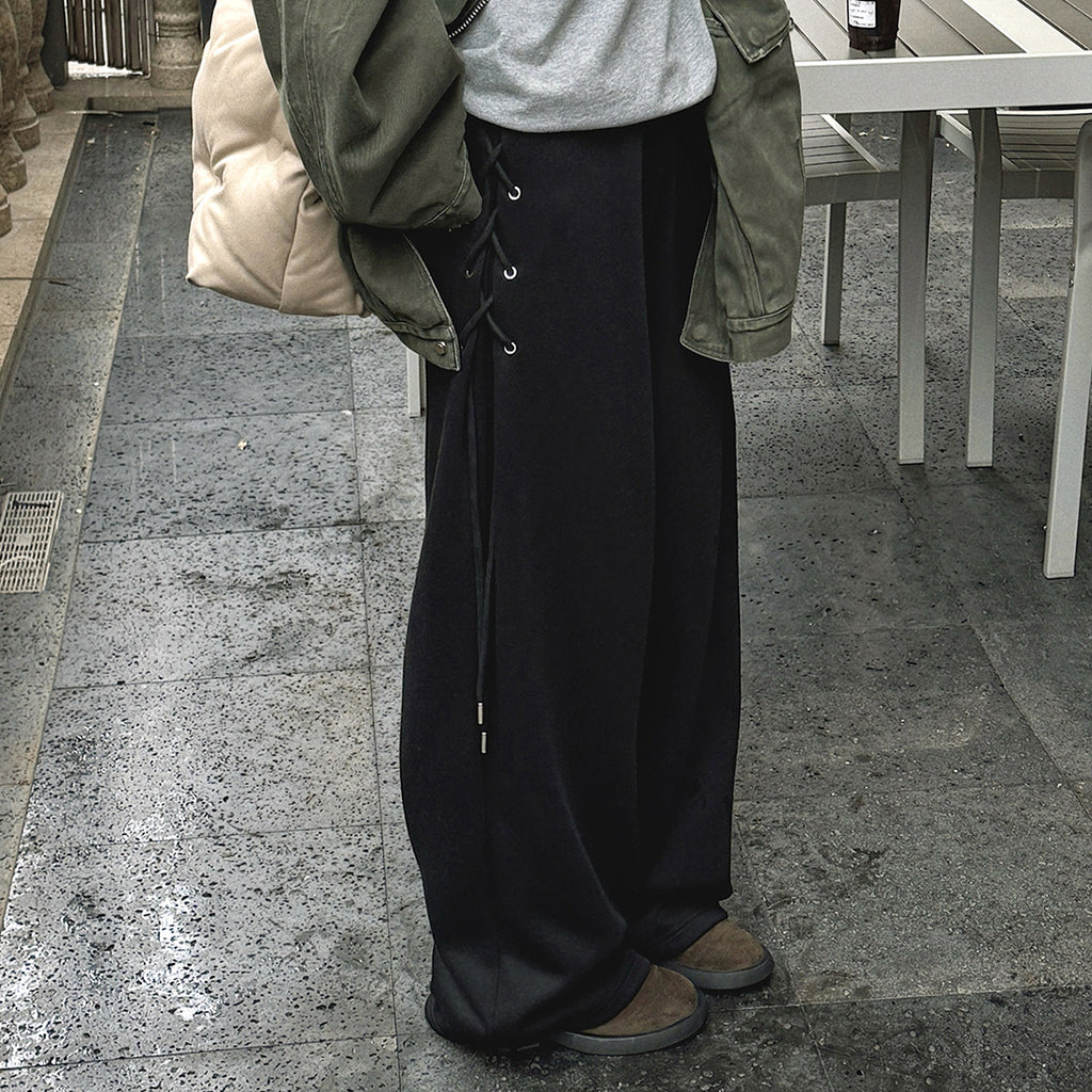 Elastic high waisted side straps and loose wide leg pants