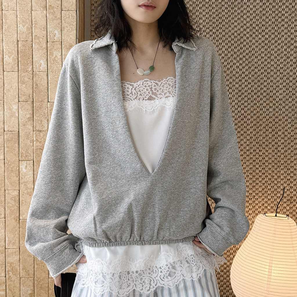 Oversized V-neck pullover sweatshirt with raw edge collar and relaxed fit
