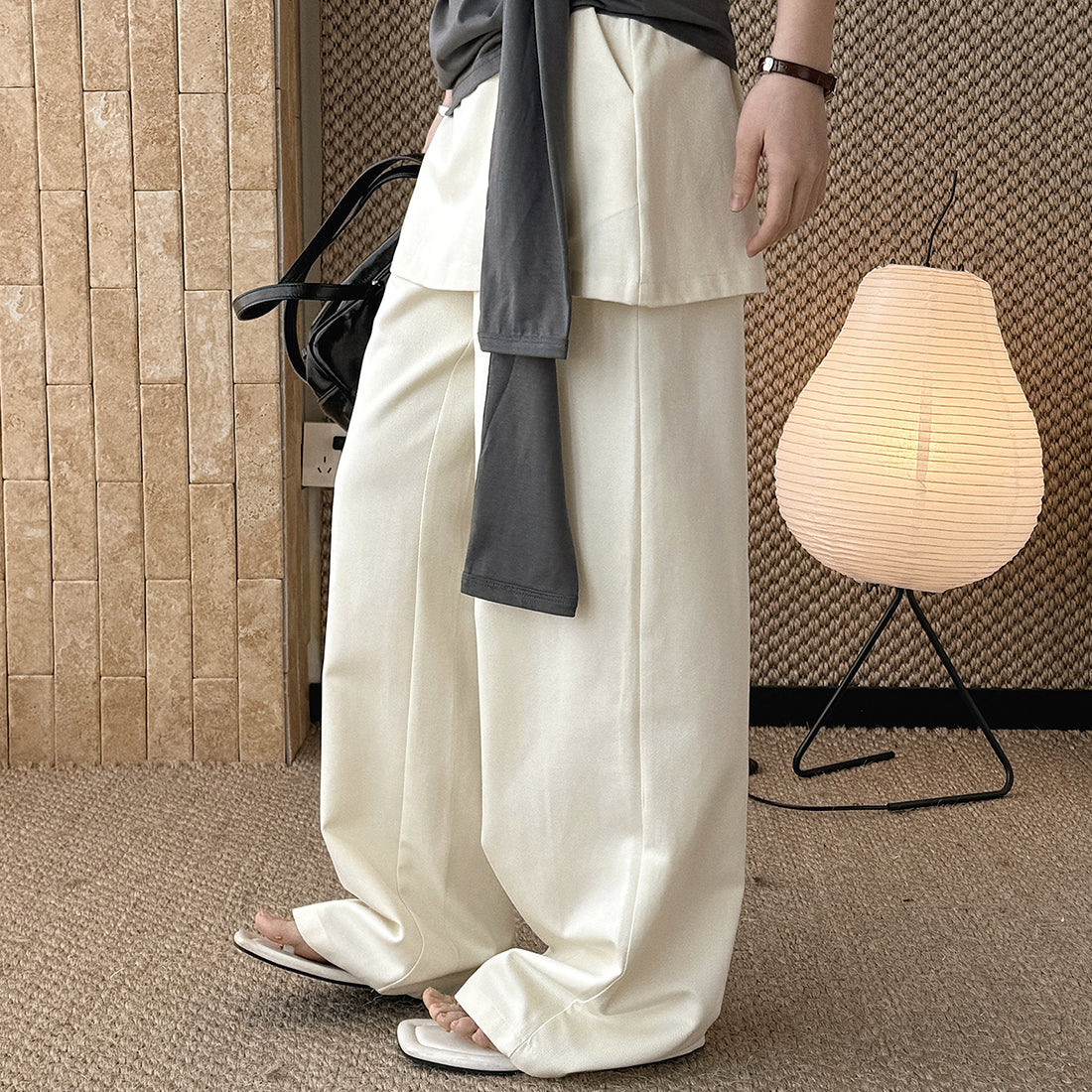 High-waisted Tencel cotton wide-leg pants in relaxed draped silhouette