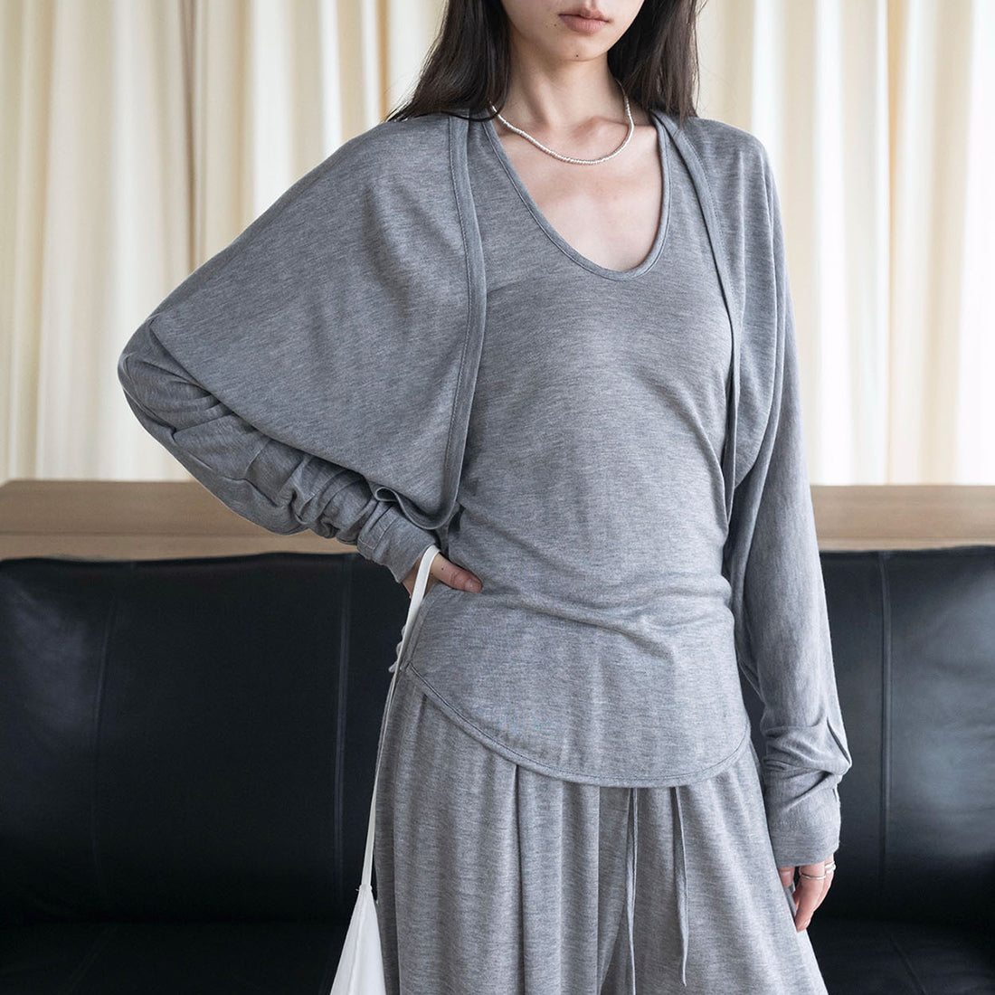 Curved short slim fit cardigan top