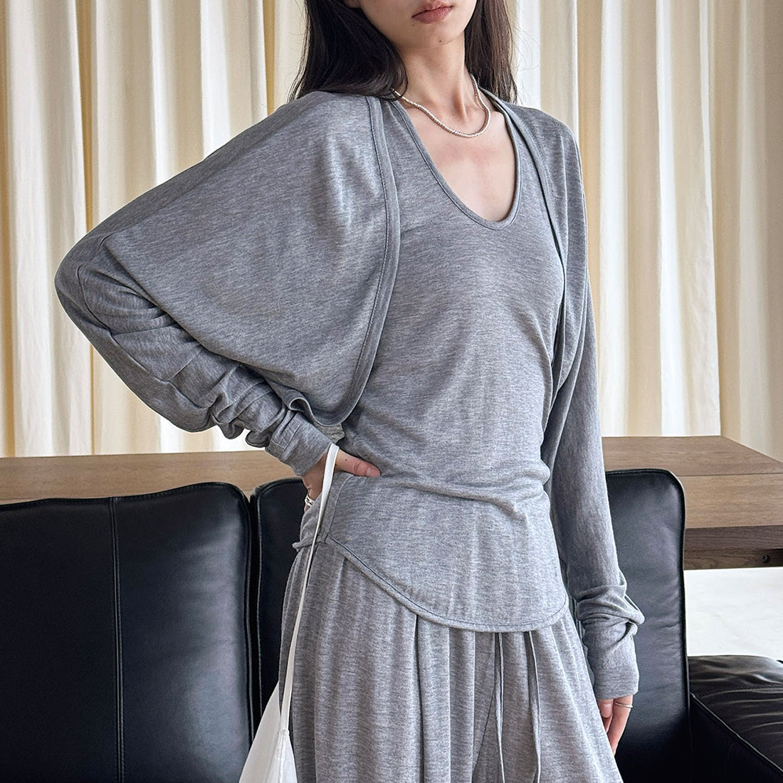 Curved short slim fit cardigan top