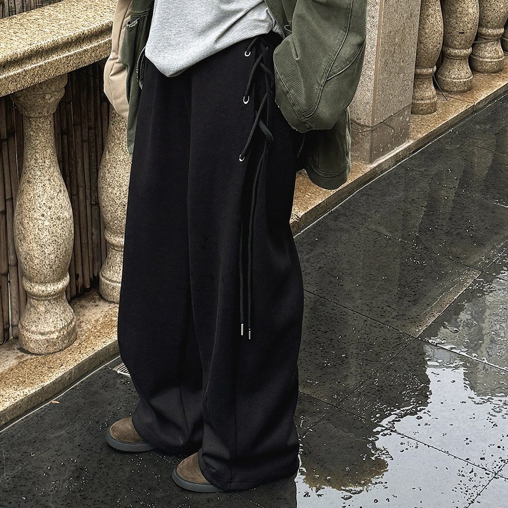 Elastic high waisted side straps and loose wide leg pants