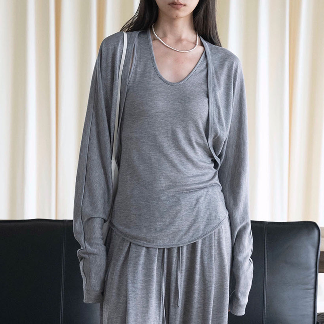 U-neck irregular hem sleeveless slim fit vest top