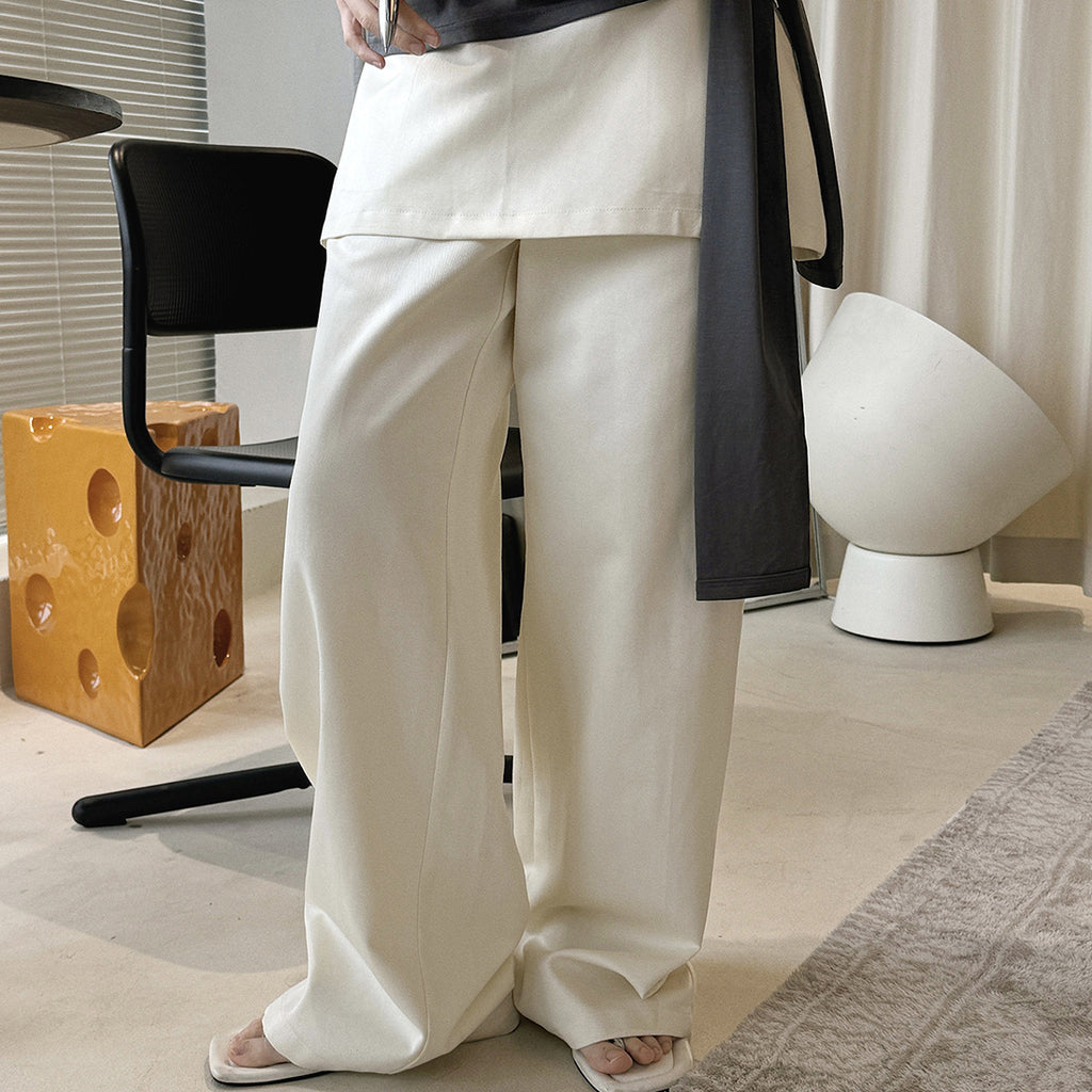 High-waisted Tencel cotton wide-leg pants in relaxed draped silhouette