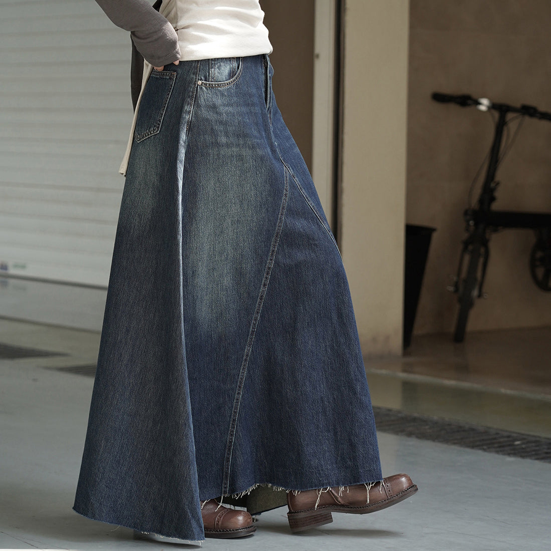 Vintage high waisted slightly fringed denim long skirt