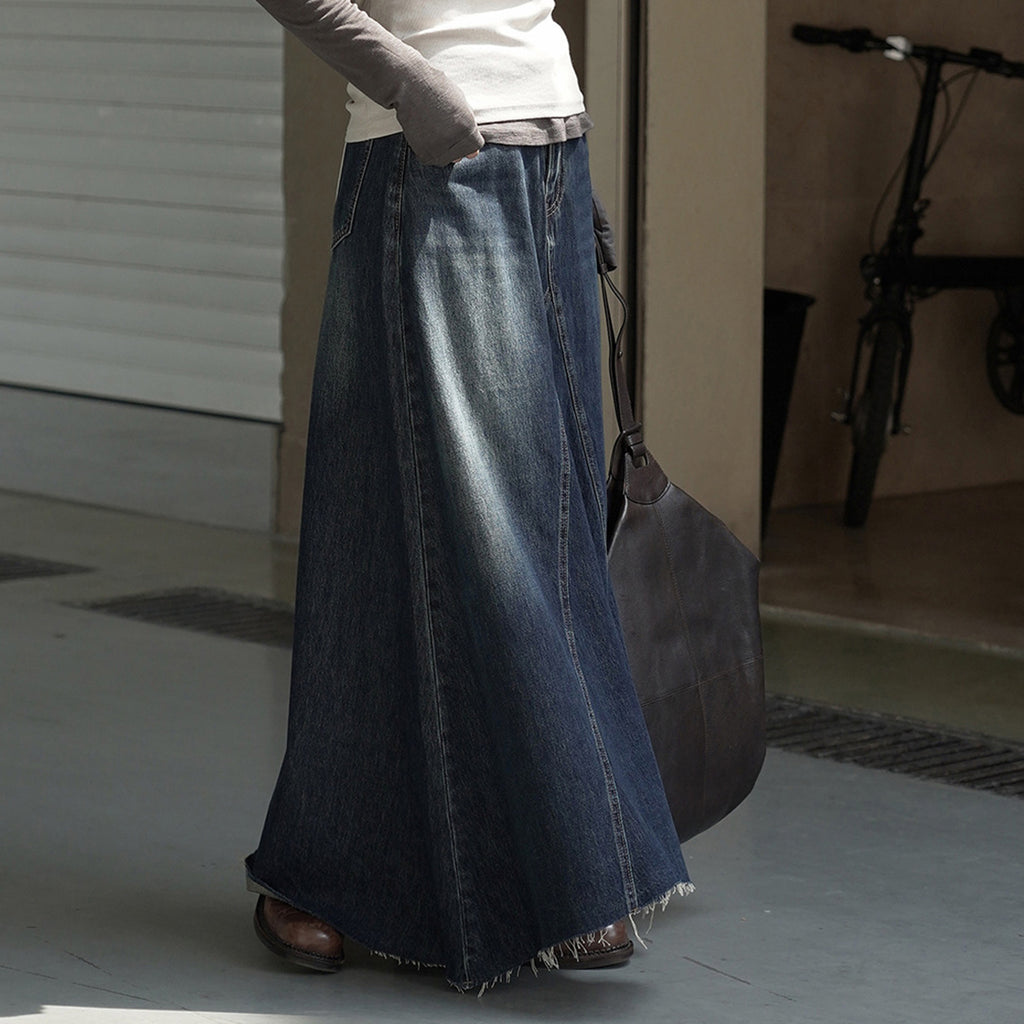 Vintage high waisted slightly fringed denim long skirt