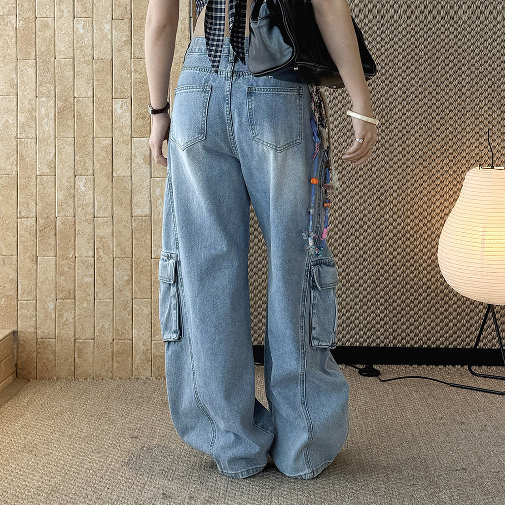 High waist vintage wash cargo wide leg jeans with utility pockets