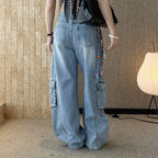 High waist vintage wash cargo wide leg jeans with utility pockets