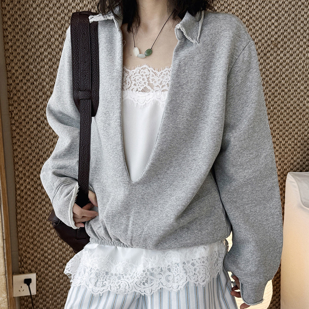 Oversized V-neck pullover sweatshirt with raw edge collar and relaxed fit