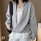 Oversized V-neck pullover sweatshirt with raw edge collar and relaxed fit