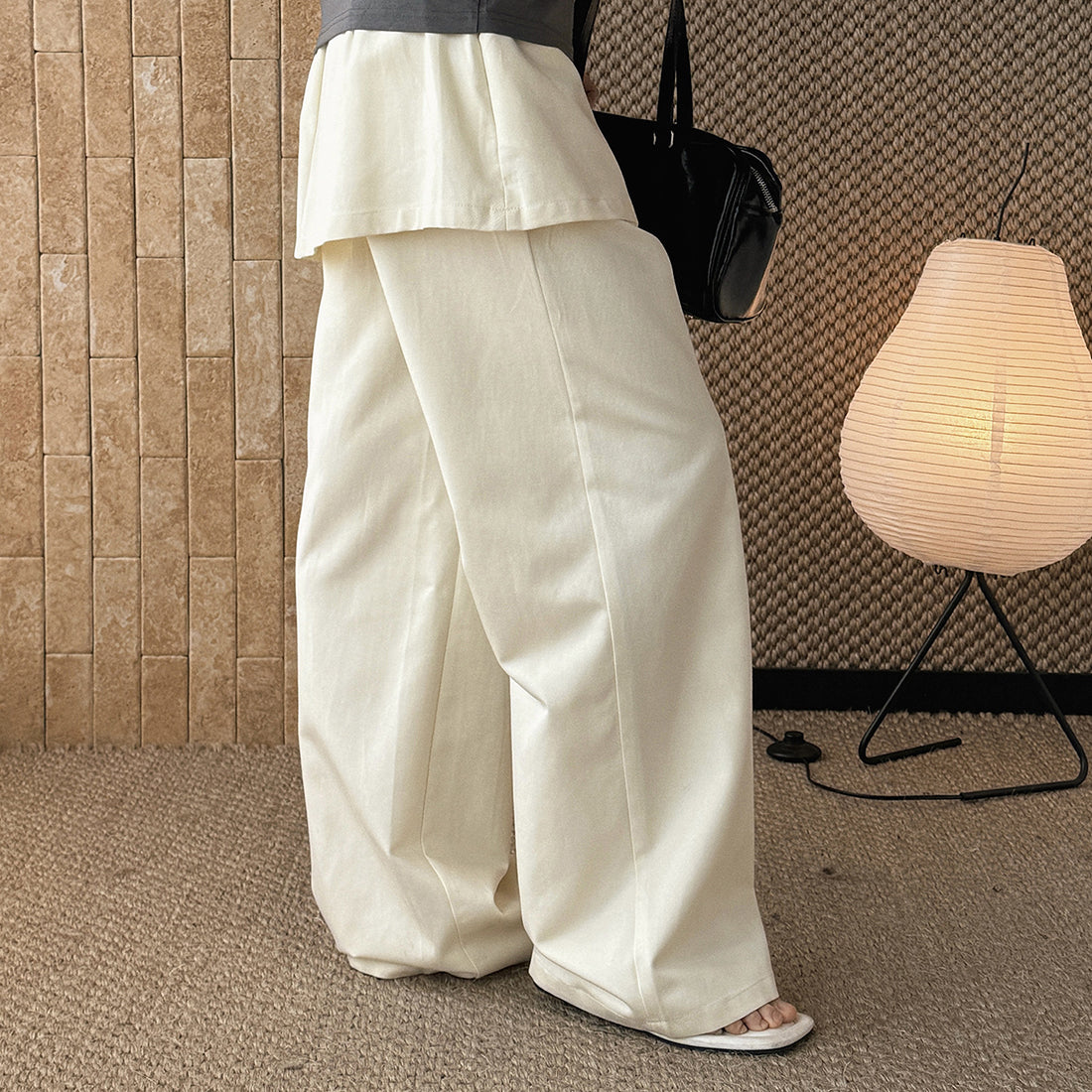 High-waisted Tencel cotton wide-leg pants in relaxed draped silhouette