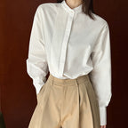 Wrinkled round neck long sleeved shirt