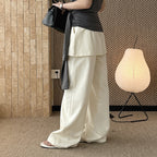 High-waisted Tencel cotton wide-leg pants in relaxed draped silhouette