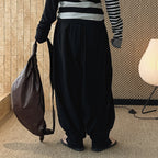 Loose fit high waist draped cuffed pants