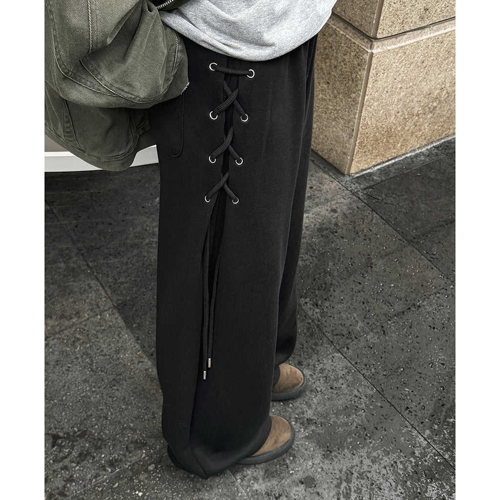 Elastic high waisted side straps and loose wide leg pants